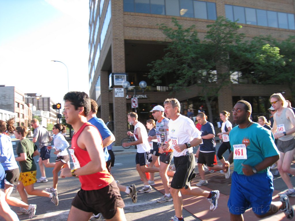 Tortoise_Hare_5K_08 140.jpg - Number 183 crosses the timing mats. Hey he is going to run the race with his eyes shut!